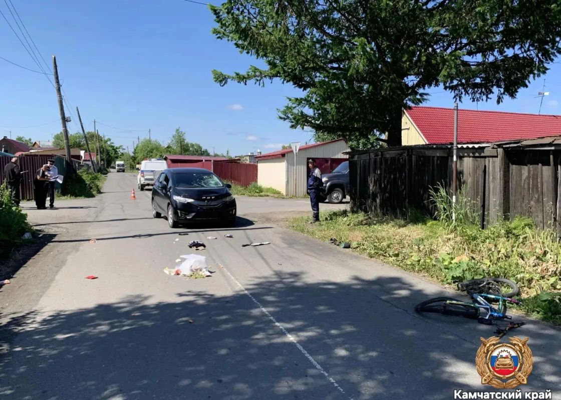 В селе Мильково ребёнок на велосипеде попал под колёса машины В селе Мильково ребёнок на велосипеде попал под колёса машины