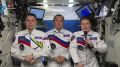 Космонавты с борта МКС поздравили россиян с Днем Государственного флага
